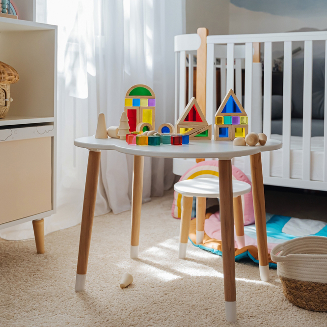 Playroom,With,Toys.,Wooden,Rainbow,Stacking,Blocks,On,The,Table