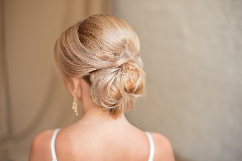 Rear,View,Of,Female,Hairstyle,Middle,Bun,With,Blond,Hair.