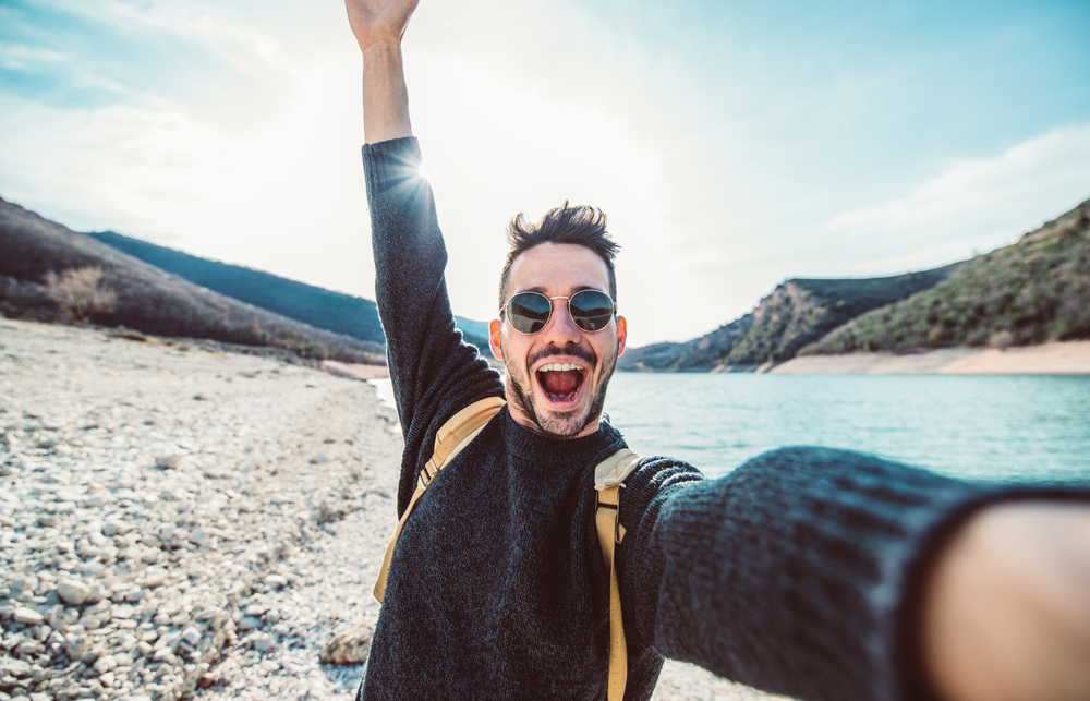 Happy,Handsome,Man,Takes,A,Selfie,Portrait,At,Vacation,Outdoor.