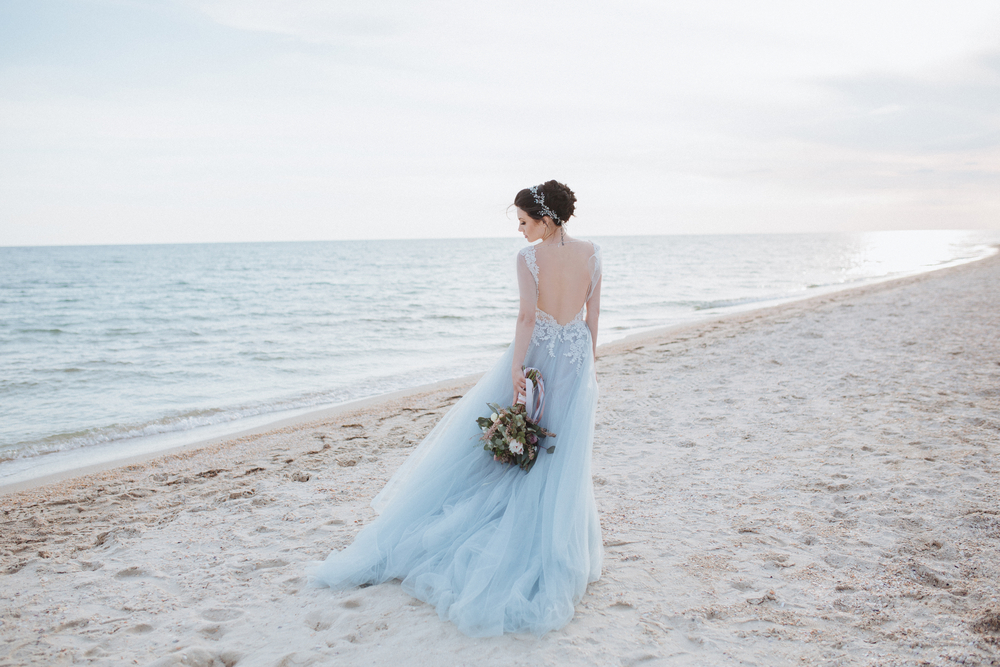 Charming,Graceful,Girl,In,Gray,Dress,On,The,Seashore
