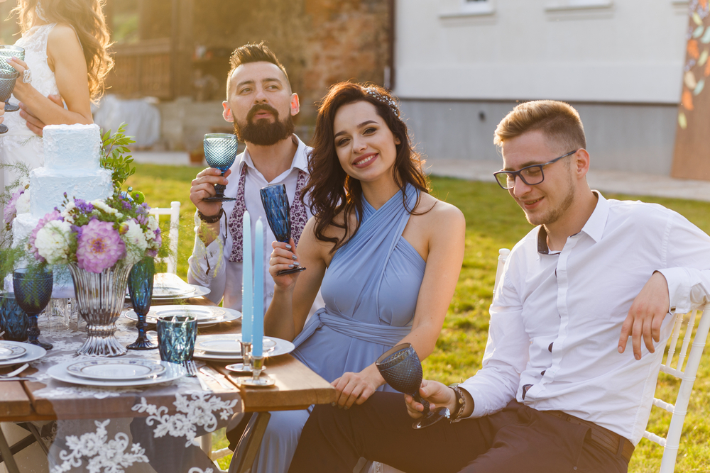 The,Newmarried,Couple,And,Guests,Enjoy,Themselves,At,The,Banquet