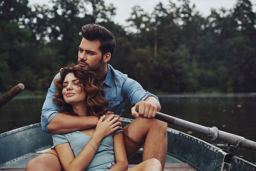Loving,Everything,About,Her.,Beautiful,Young,Couple,Embracing,And,Looking