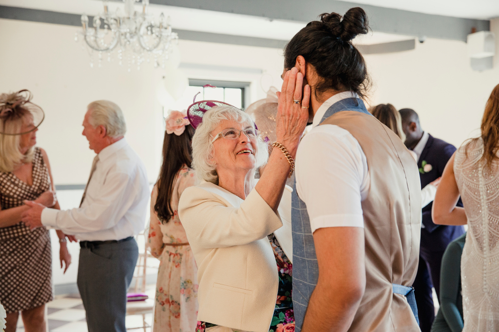 Senior,Woman,Is,Appreciating,Her,Grandson,On,His,Wedding,Day.