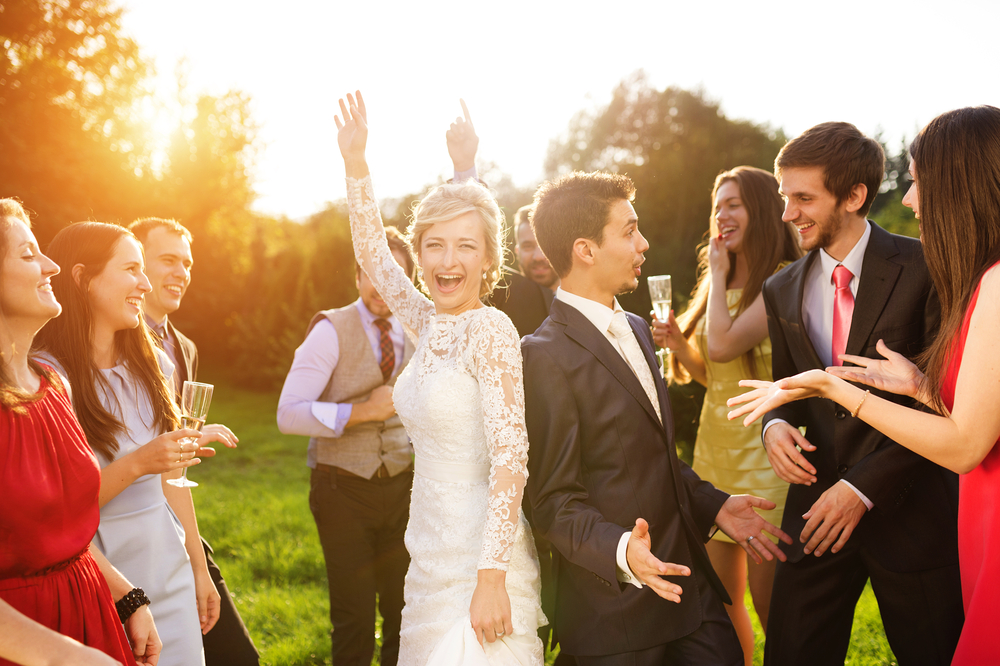 Full,Length,Portrait,Of,Newlywed,Couple,Dancing,And,Having,Fun