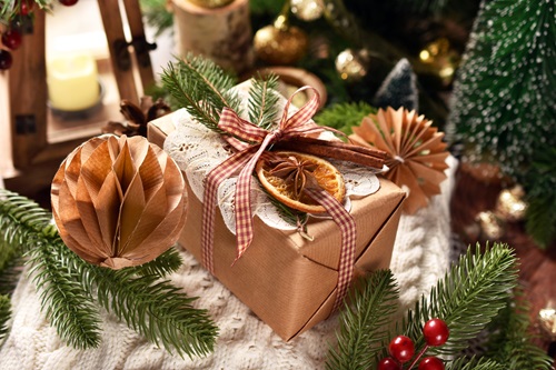 Creatively,Wrapped,Christmas,Present,With,Vintage,Style,Lace,Doily,,Fir